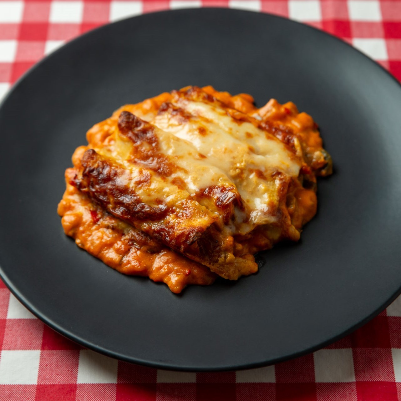 Canelones de atún con bechamel de gambas al ajillo